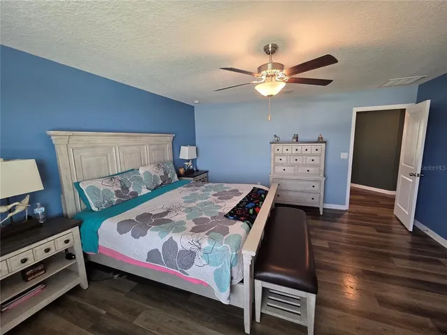 a bathroom with double vanity sinks a mirror and a shower