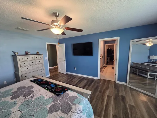 a bathroom with a shower and a sink