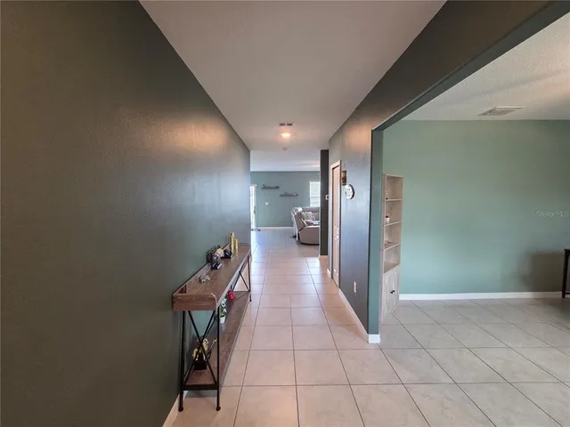 a workspace with furniture and a window