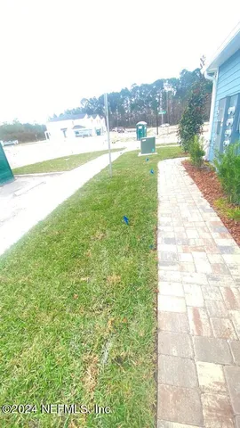 a view of a bedroom with a bed and closet