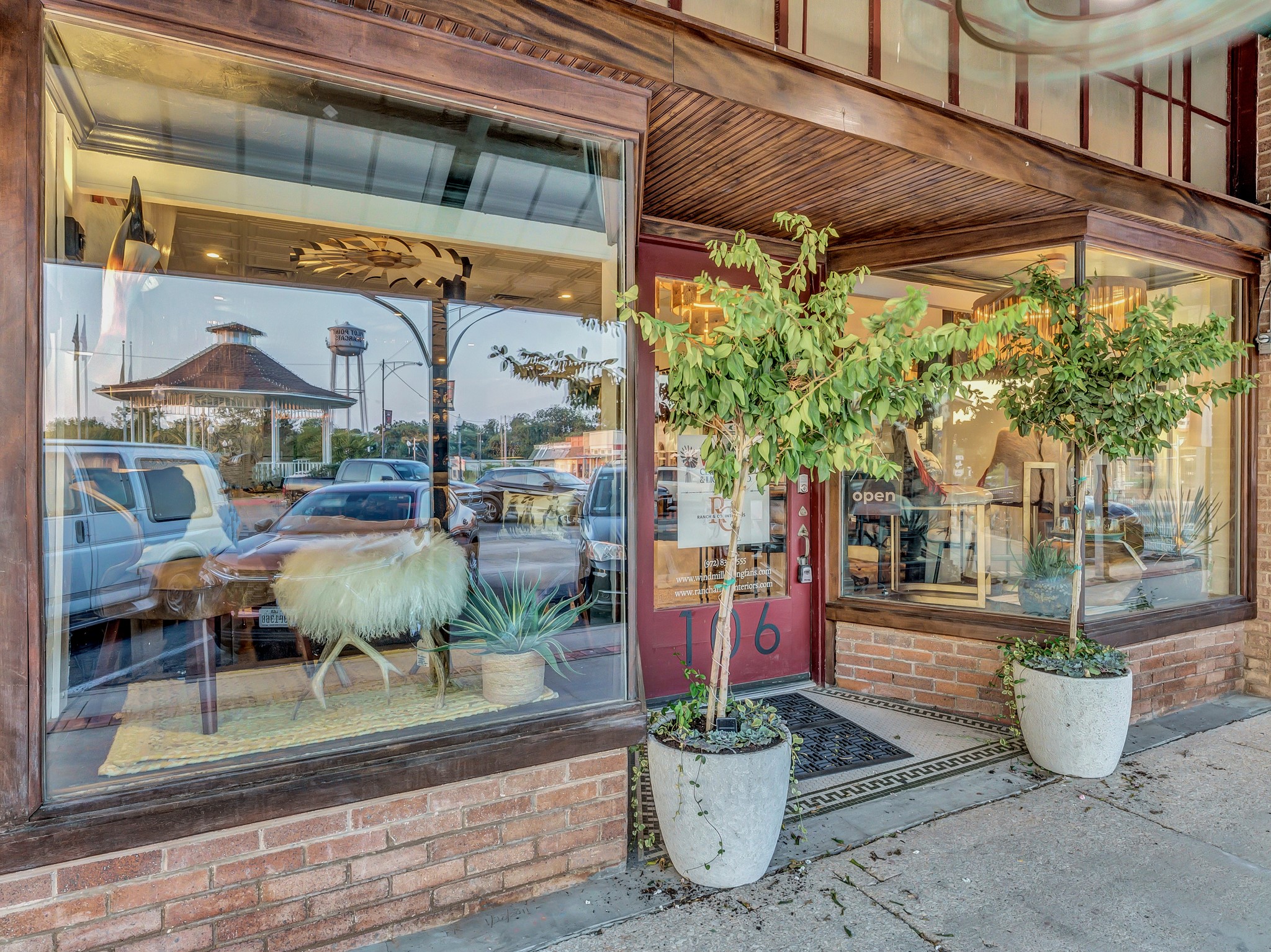 106 West Main Street Pilot Point, TX 76258 - Photo 41 of 46 a view of a patio with table and chairs potted plants