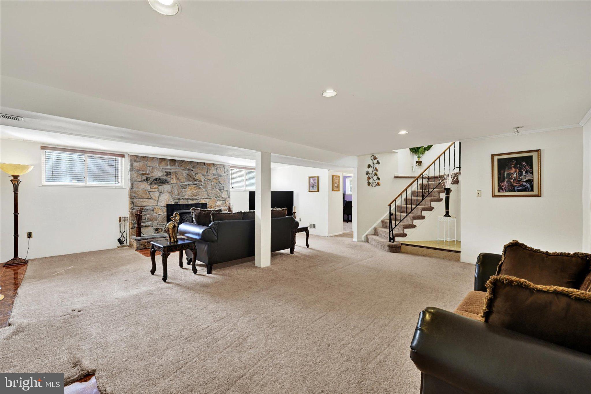 9704 Eustice Road Randallstown, MD 21133 - Photo 26 of 43 Spacious, inviting lower-level retreat.