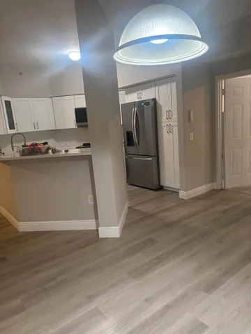 a view of a kitchen with a sink