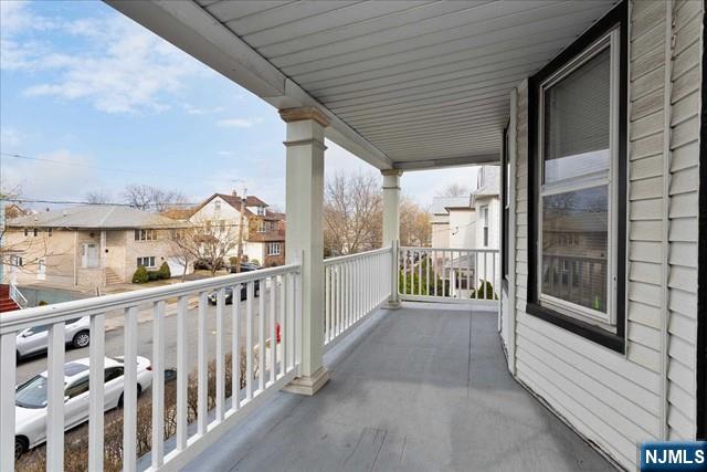 20 Dankoff Avenue, Unit 1 Wallington, NJ 07057 - Photo 12 of 15 a view of a balcony