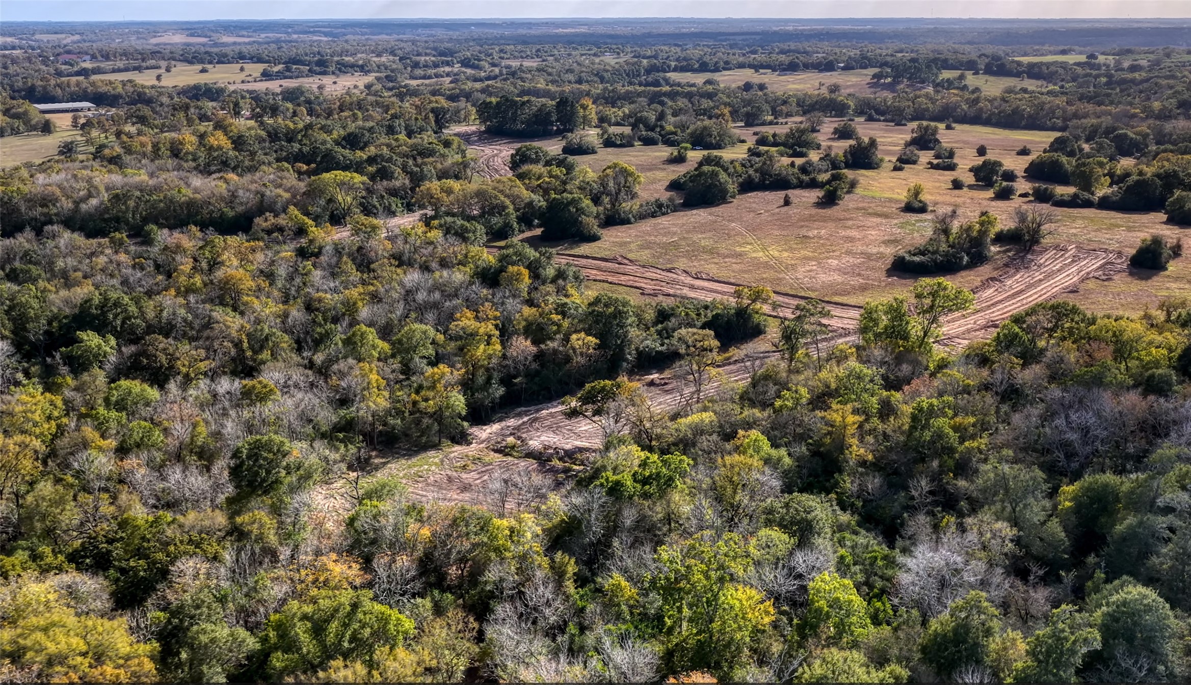 22 Millwood Trail Brenham, TX 77833 - Photo 3 of 9 an aerial view of residential houses with city view
