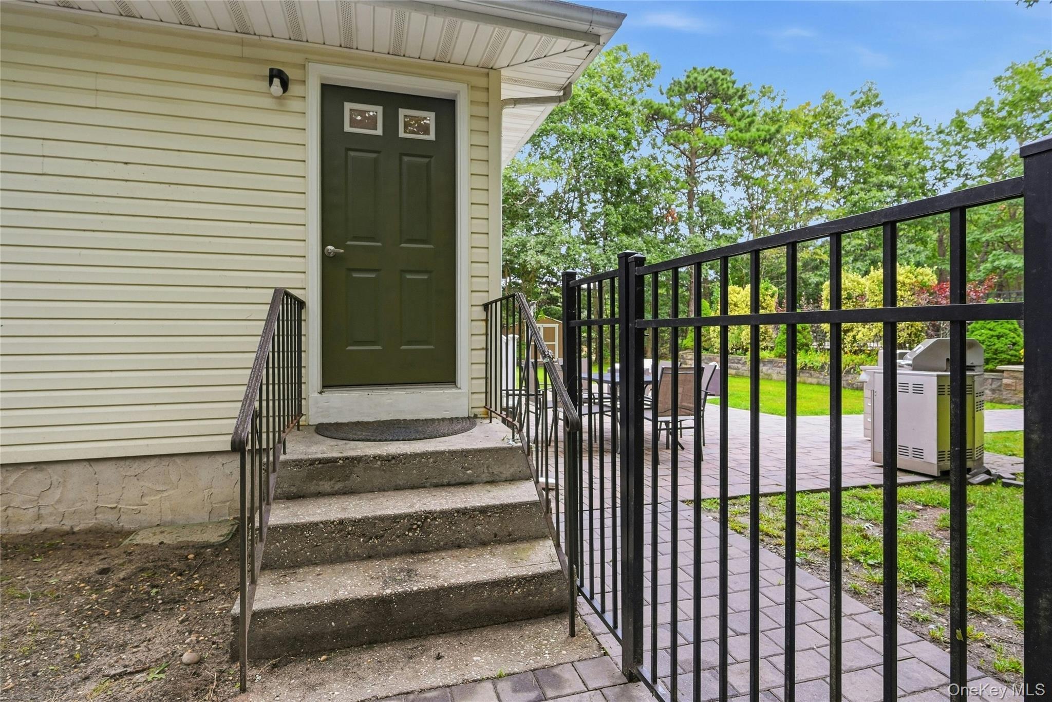16 Georgann Road Manorville, NY 11949 - Photo 26 of 32 Side entry to home, direct access to basement.