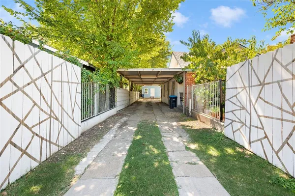 a view of house with backyard