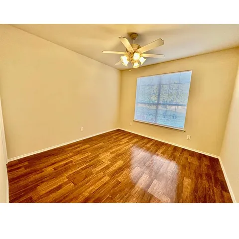 a black and white photo of a big room