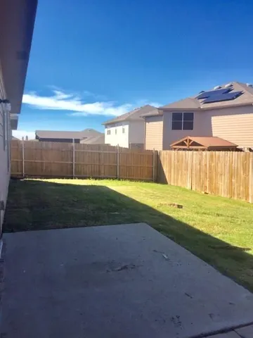 a view of a house with a swimming pool