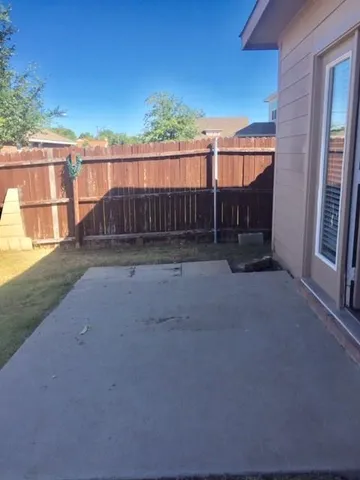 a view of balcony with furniture
