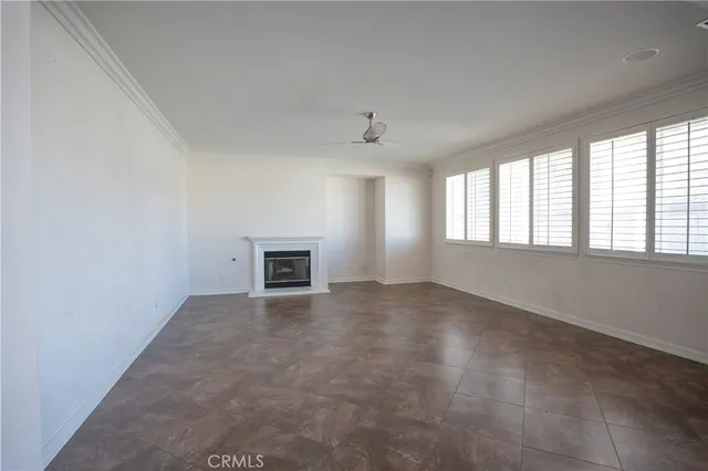 a view of storage and utility room with a window