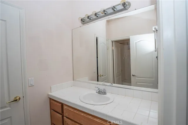 a view of entryway with wooden floor and stairs