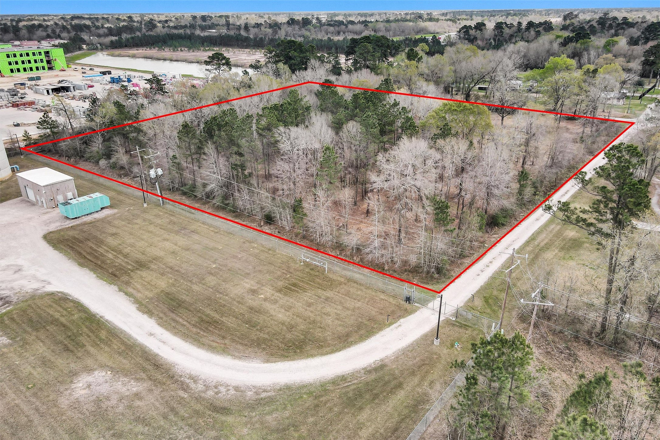2921 Beasley Road Conroe, TX 77301 - Photo 4 of 18 a view of a wooden bridge