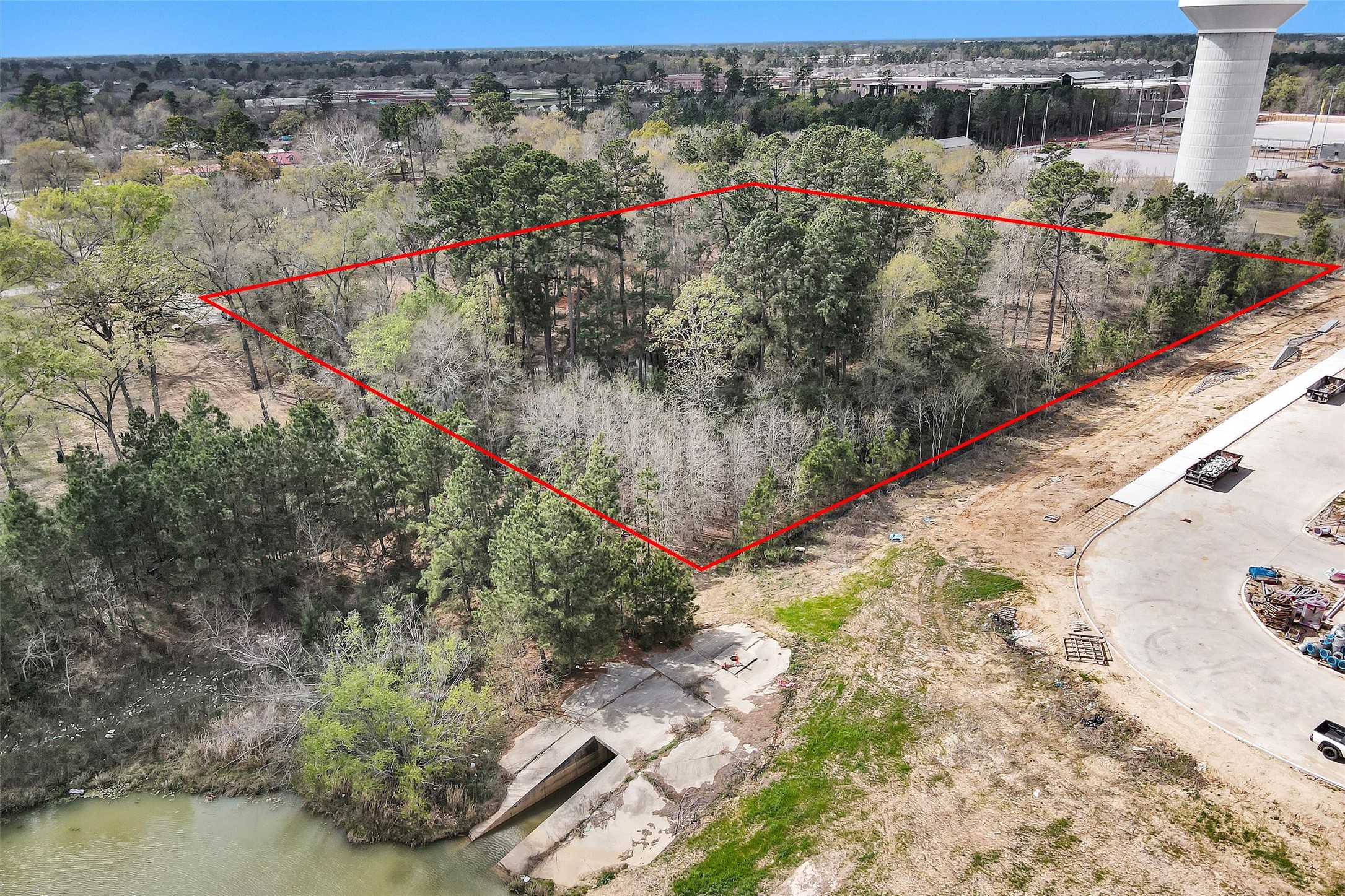 2921 Beasley Road Conroe, TX 77301 - Photo 6 of 18 a view of a lake with a mountain view
