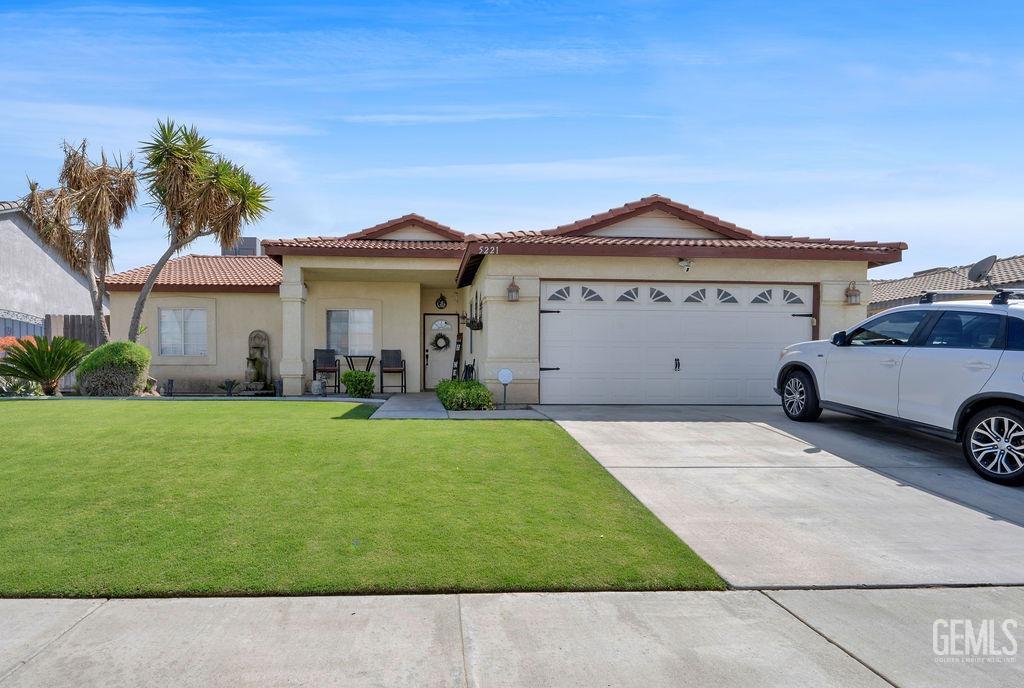 a house view with a garden space