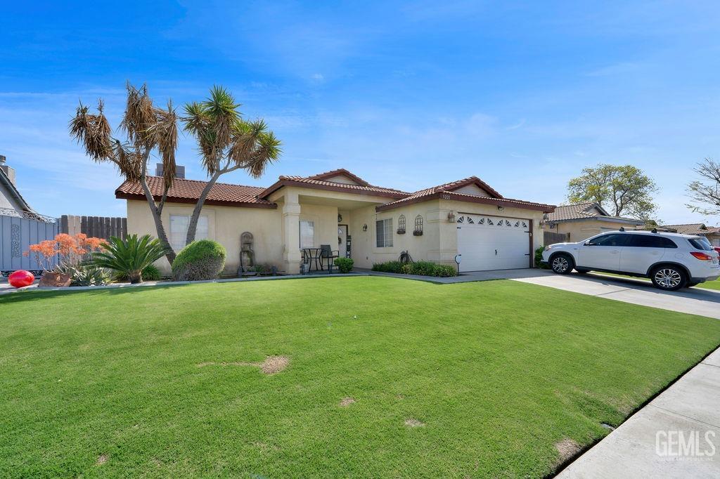Undisclosed Address Bakersfield, CA 93307 - Photo 3 of 30 a house view with a garden space
