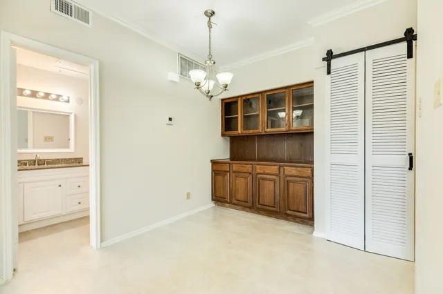 a view of cabinet and kitchen