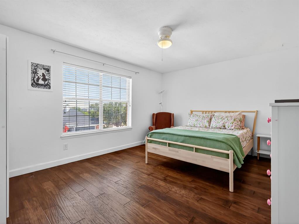 2052 Diamond Ridge Drive Carrollton, TX 75010 - Photo 39 of 40 a bedroom with a bed and a window