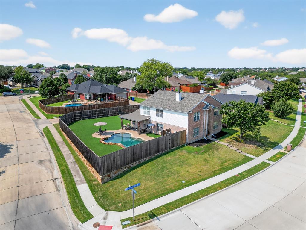 2052 Diamond Ridge Drive Carrollton, TX 75010 - Photo 9 of 40 a view of a swimming pool with lounge chair