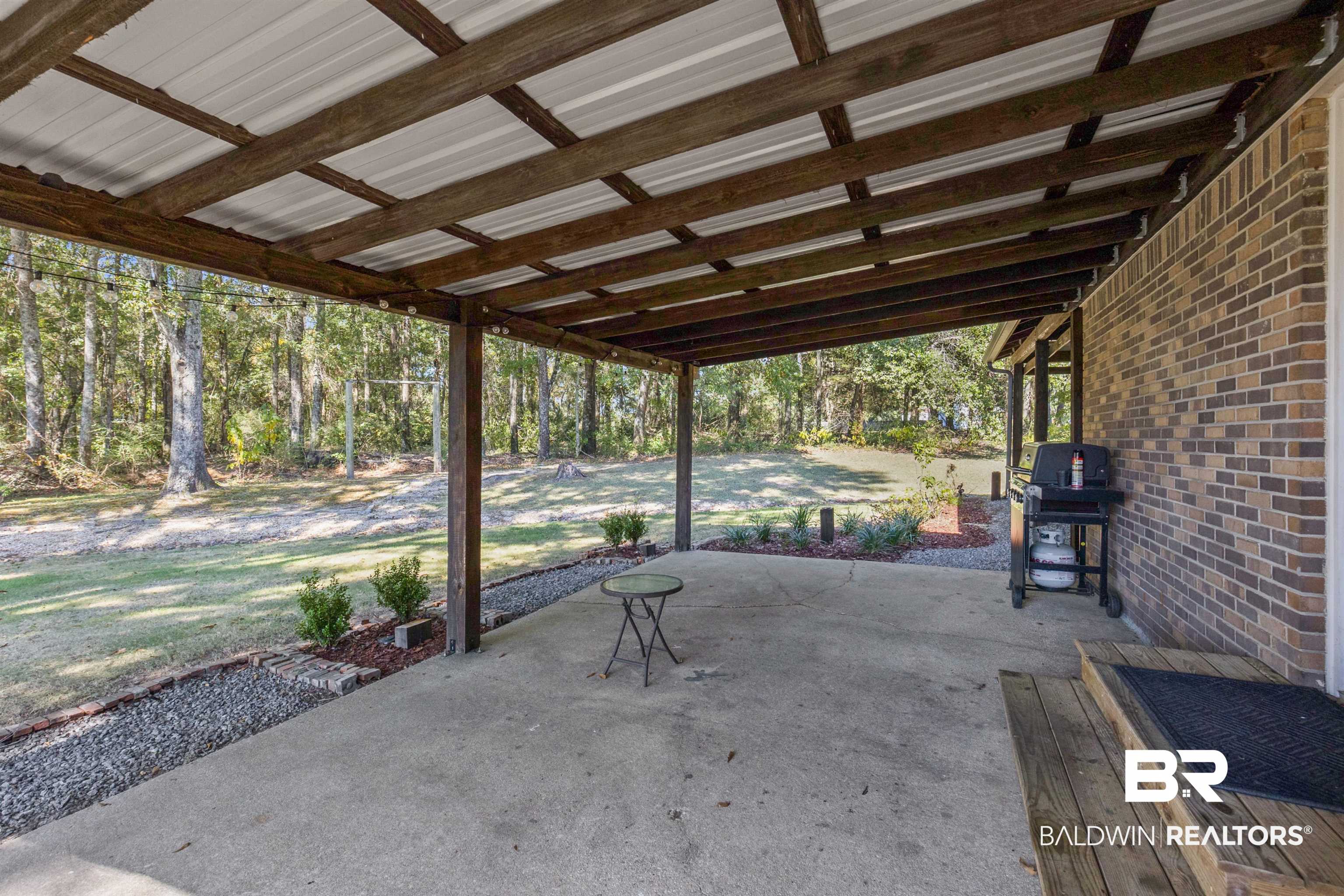8911 Owassa Road Evergreen, AL 36401 - Photo 20 of 24 View of patio featuring grilling area