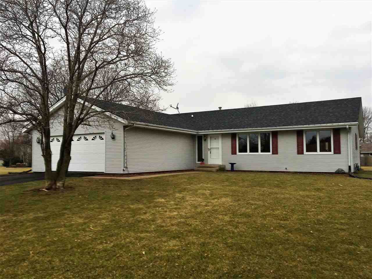 6282 Upper Ridge Way Roscoe, IL 61073 - Photo 1 of 23 a house that has a big yard