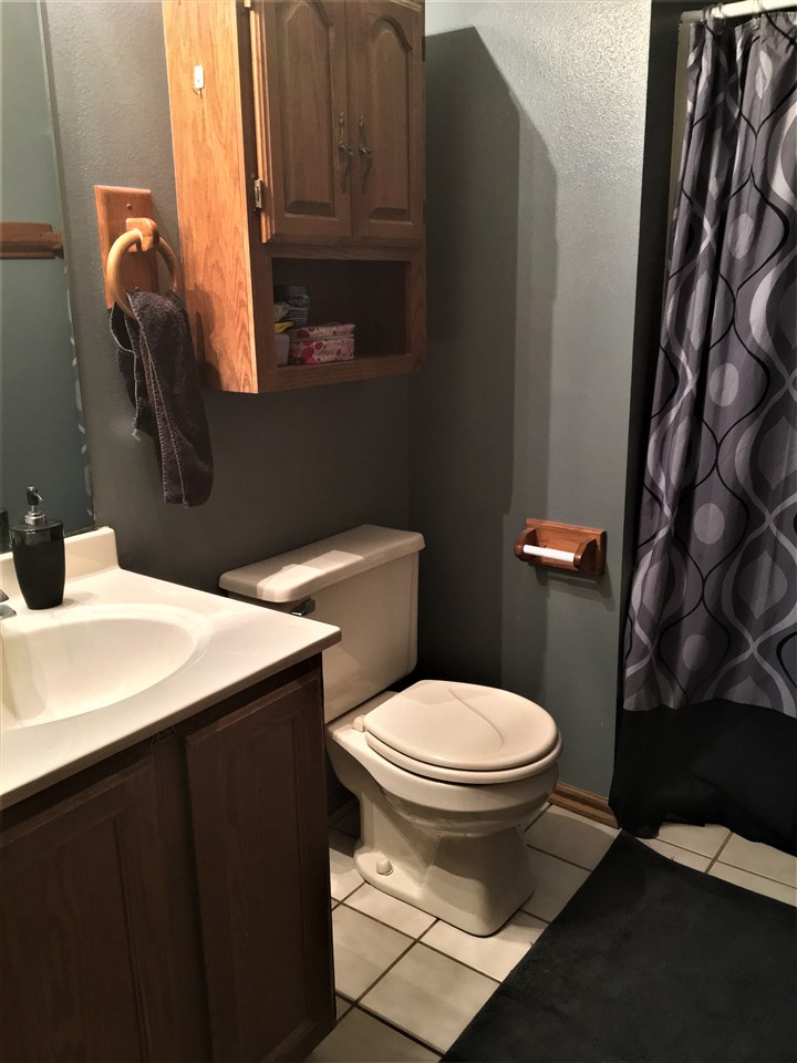 6282 Upper Ridge Way Roscoe, IL 61073 - Photo 14 of 23 a bathroom with a sink and a toilet
