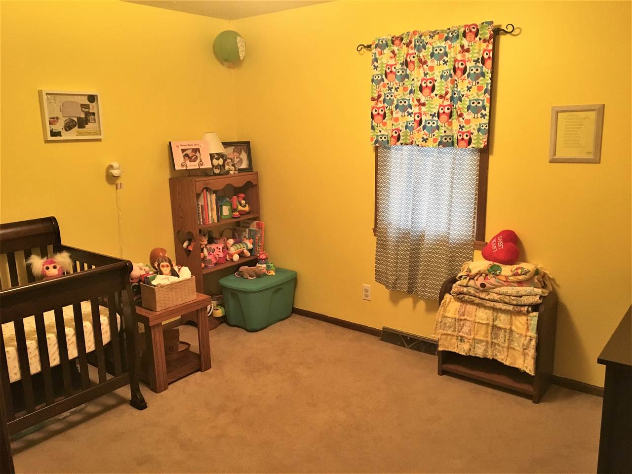6282 Upper Ridge Way Roscoe, IL 61073 - Photo 16 of 23 a bedroom with a bed and a window