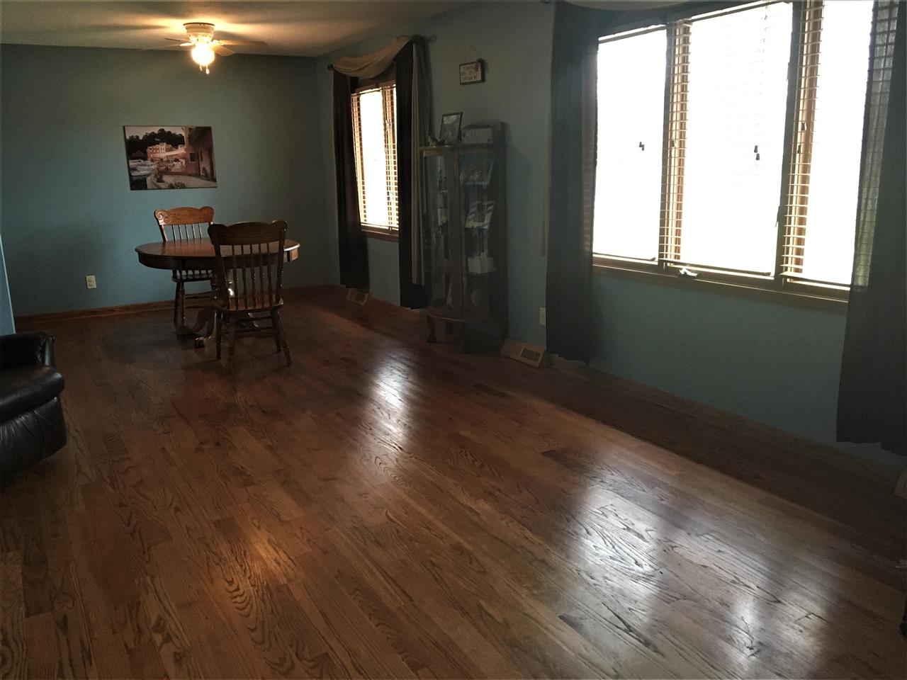 6282 Upper Ridge Way Roscoe, IL 61073 - Photo 5 of 23 a view of a dining room with furniture and chandelier