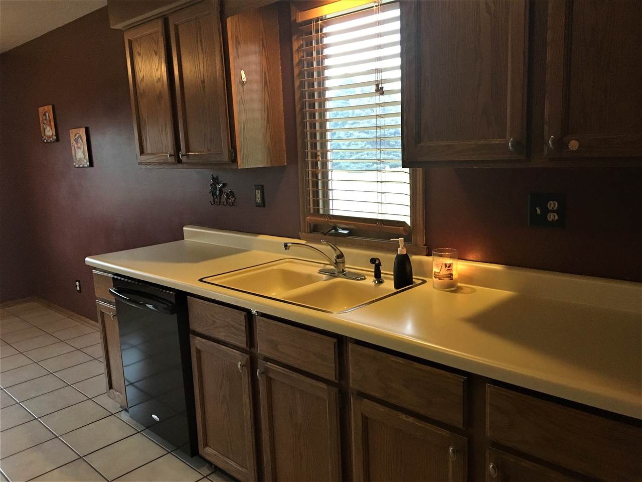 6282 Upper Ridge Way Roscoe, IL 61073 - Photo 9 of 23 a kitchen with a sink cabinets and window