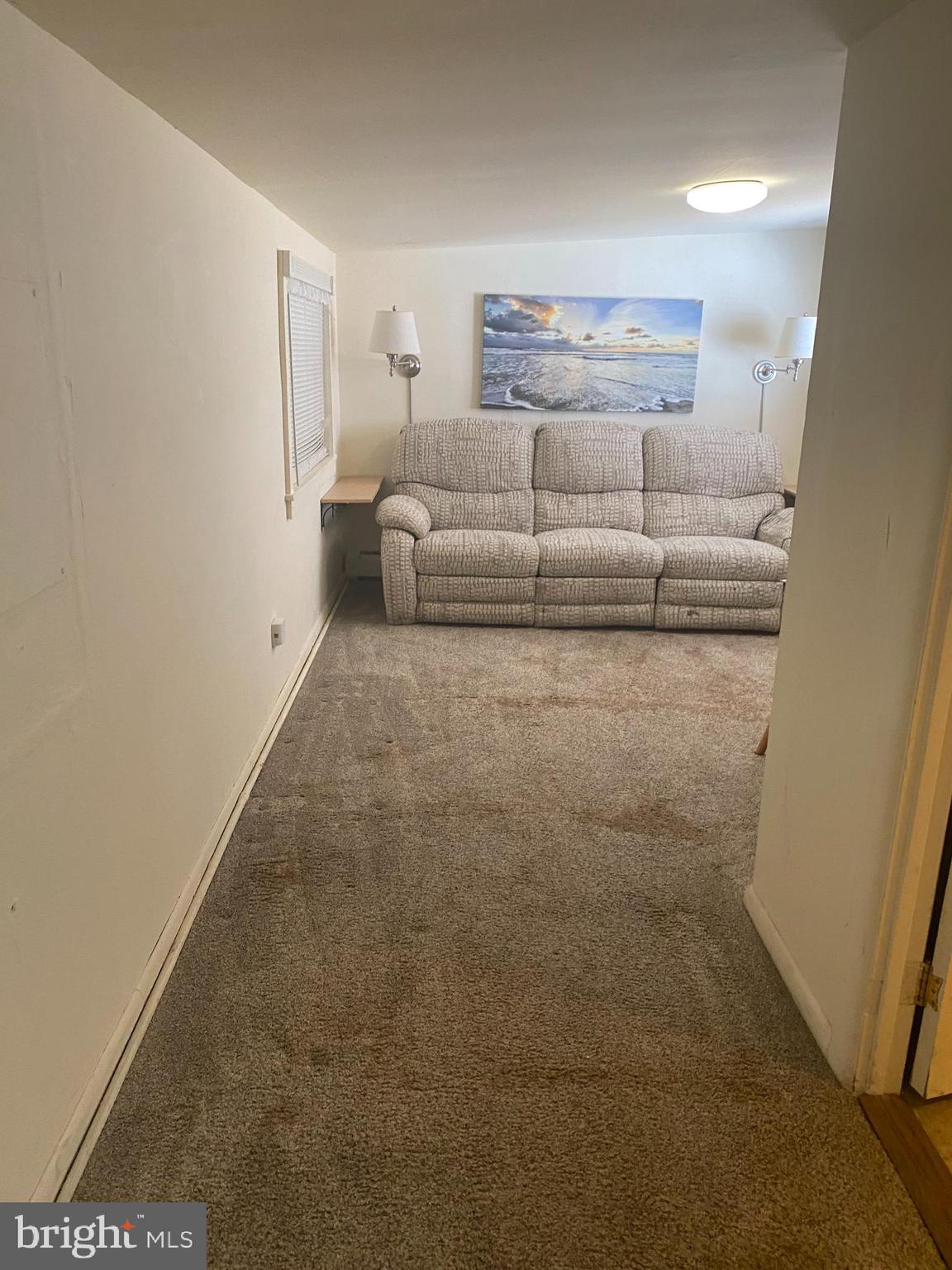 220 Crystal Drive Williamstown, NJ 08094 - Photo 11 of 16 a living room with furniture and a rug