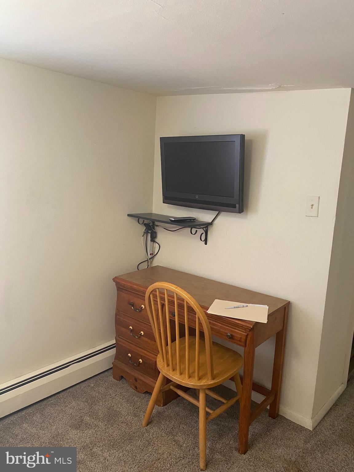 220 Crystal Drive Williamstown, NJ 08094 - Photo 12 of 16 a bedroom with a bed and a flat screen tv