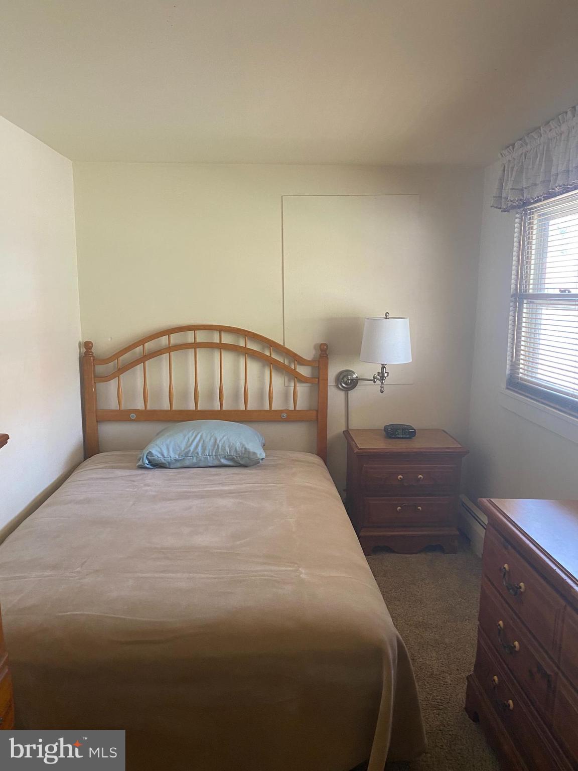 220 Crystal Drive Williamstown, NJ 08094 - Photo 14 of 16 a bedroom with a bed a window and dresser