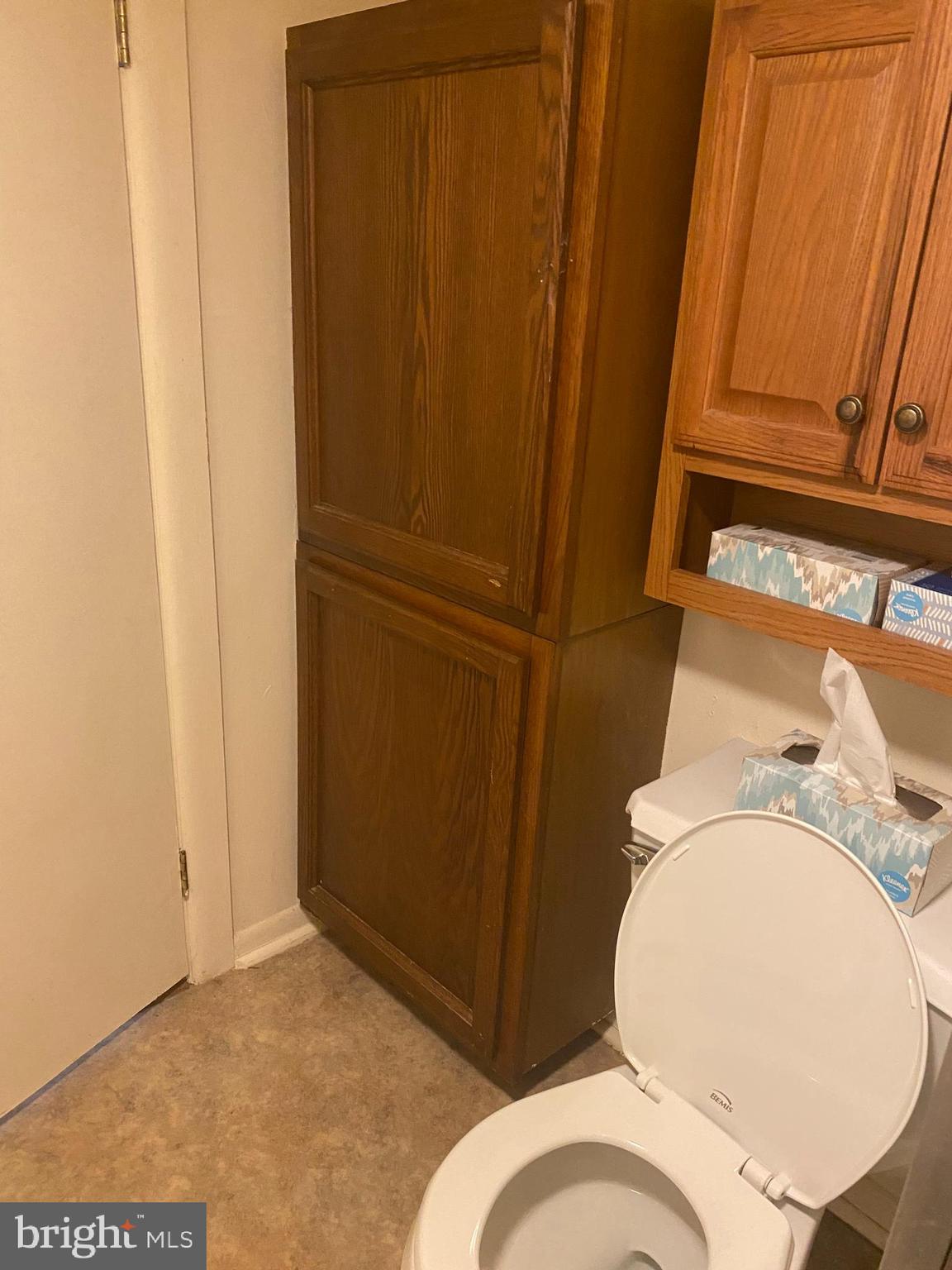 220 Crystal Drive Williamstown, NJ 08094 - Photo 15 of 16 a bathroom with a toilet and a mirror