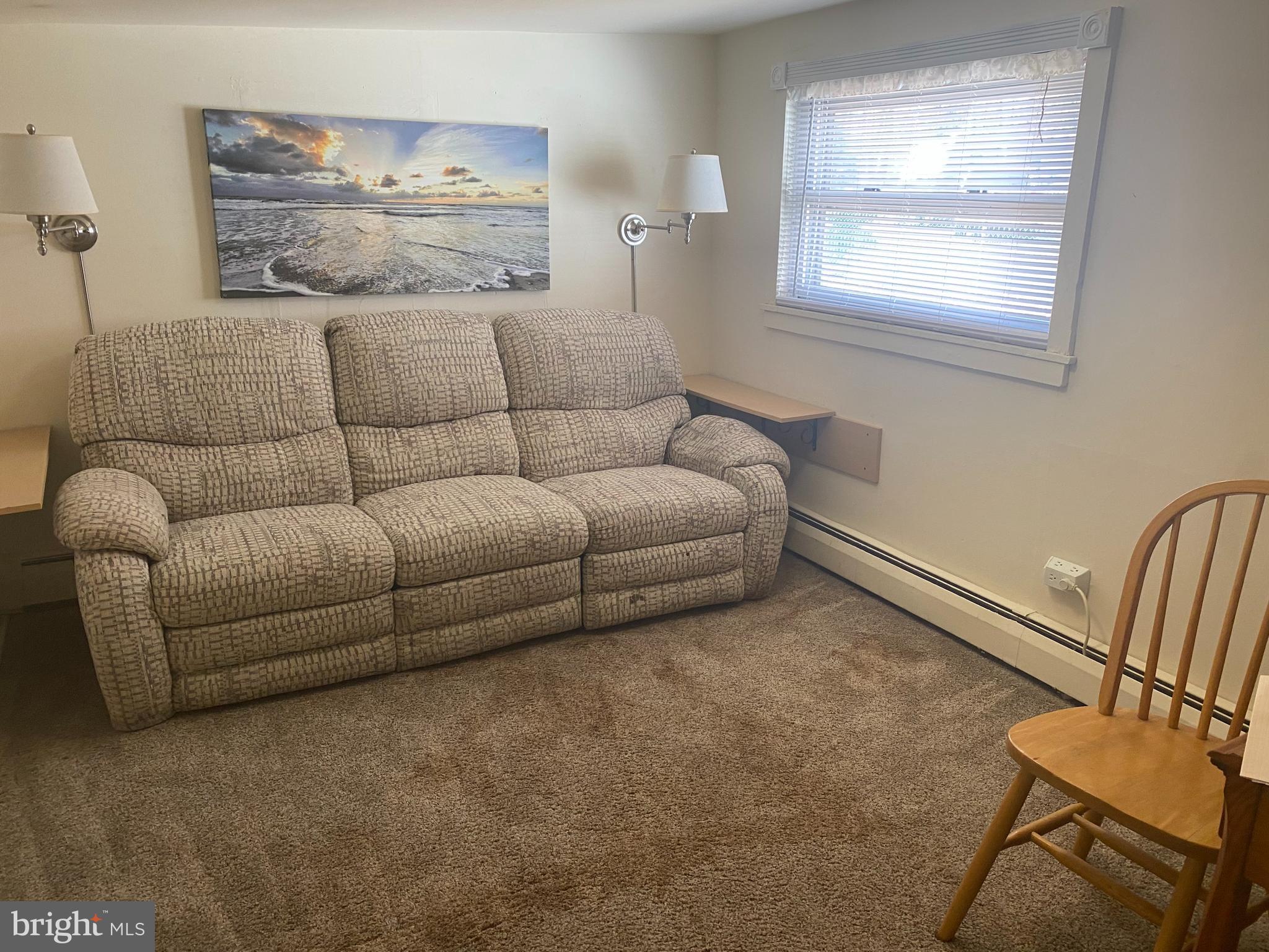 220 Crystal Drive Williamstown, NJ 08094 - Photo 10 of 16 a living room with furniture and a window