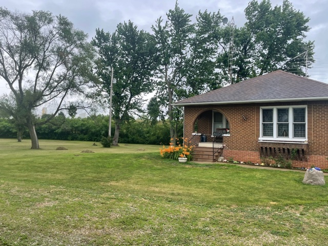 1116 North 29th Road Ottawa, IL 61350 - Photo 5 of 9 a view of a house with a yard and sitting area