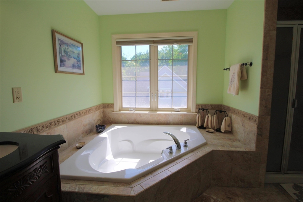 5 Gableview Lane Southwick, MA 01077 - Photo 29 of 41 a bathroom with a sink and a bathtub