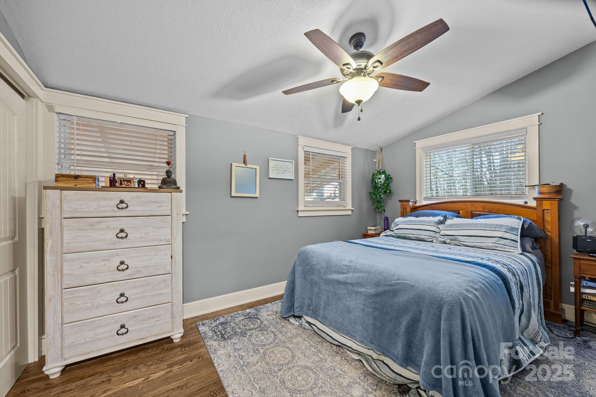 2144 Wilson Road Asheville, NC 28806 - Photo 16 of 27 a bedroom with a bed and window