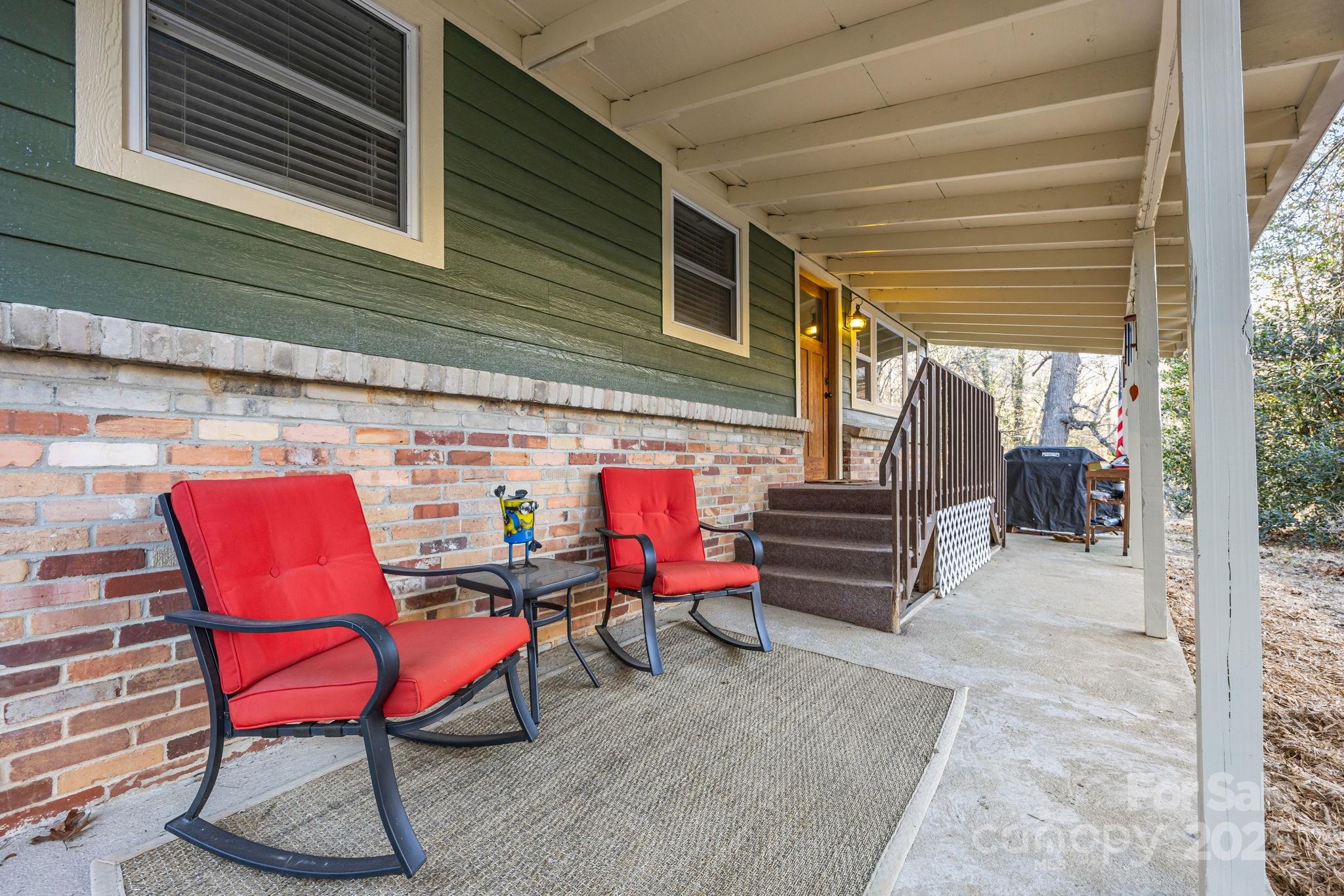 2144 Wilson Road Asheville, NC 28806 - Photo 7 of 27 a view of a two chairs in the balcony