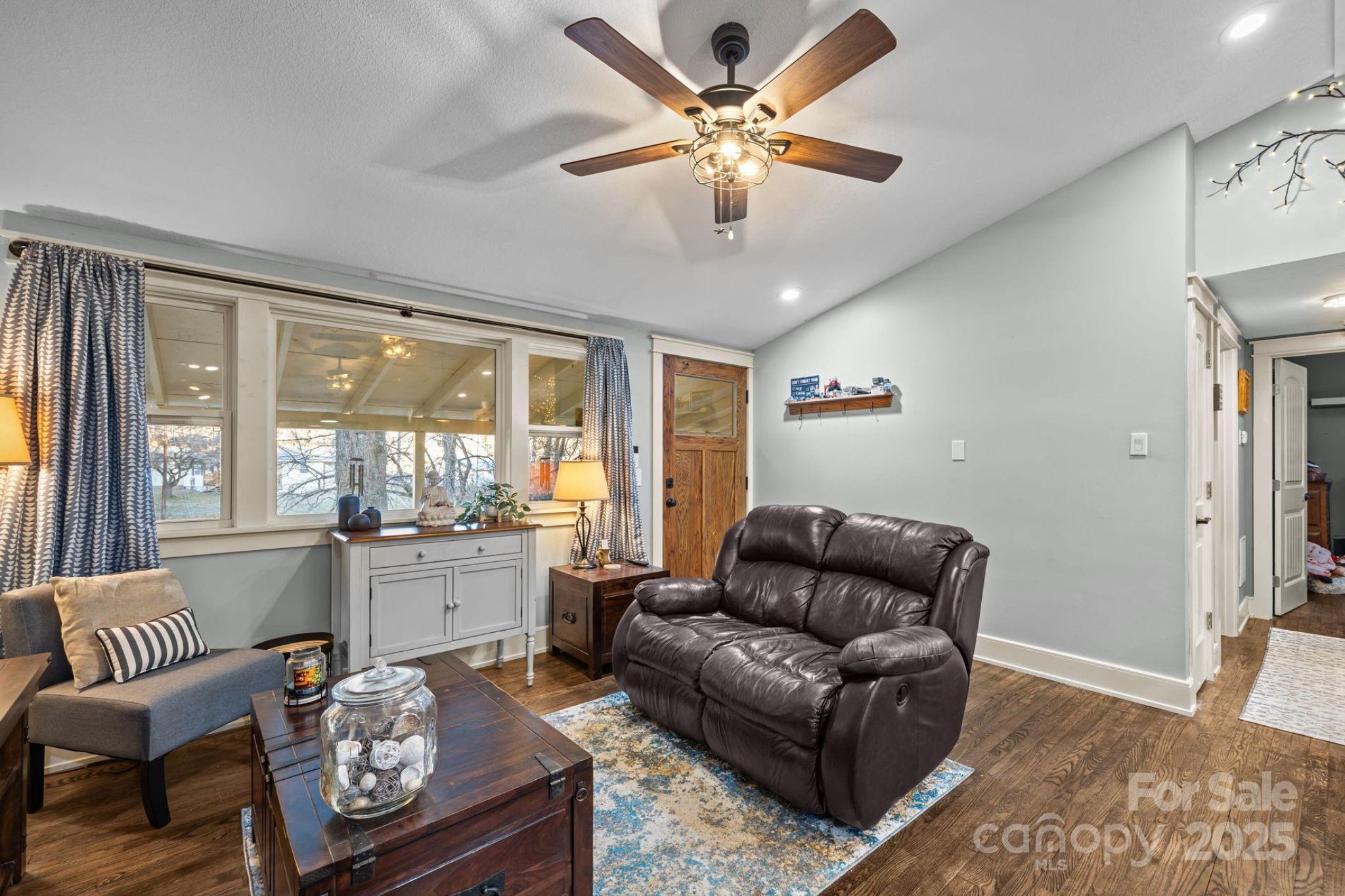 2144 Wilson Road Asheville, NC 28806 - Photo 9 of 27 a living room with furniture and a large window