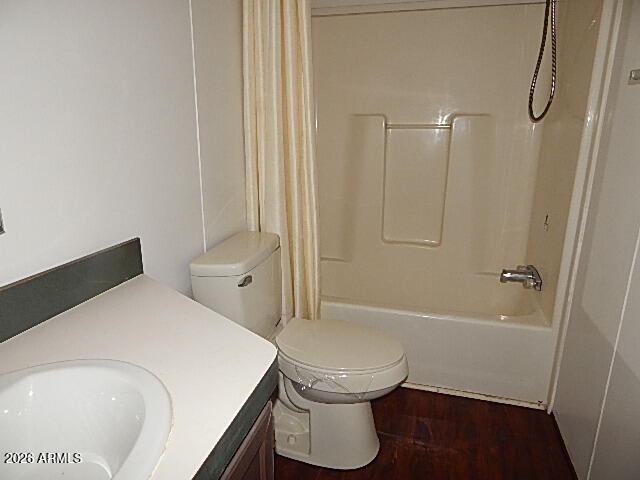 24231 West Patton Road Wittmann, AZ 85361 - Photo 5 of 12 a bathroom with a toilet and a shower