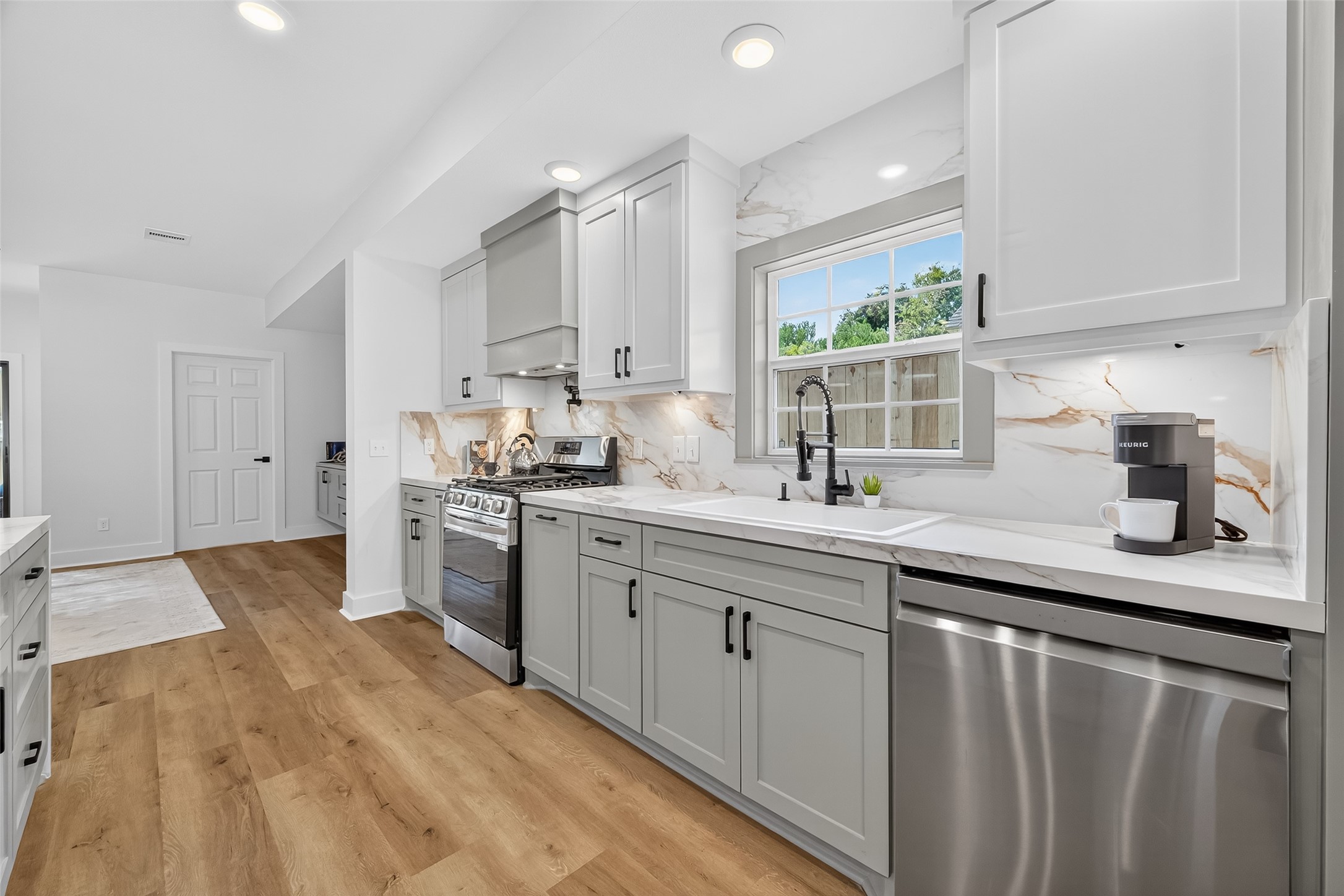 906 Eleanor Street Houston, TX 77009 - Photo 14 of 47 The window over the kitchen sink is so quaint!