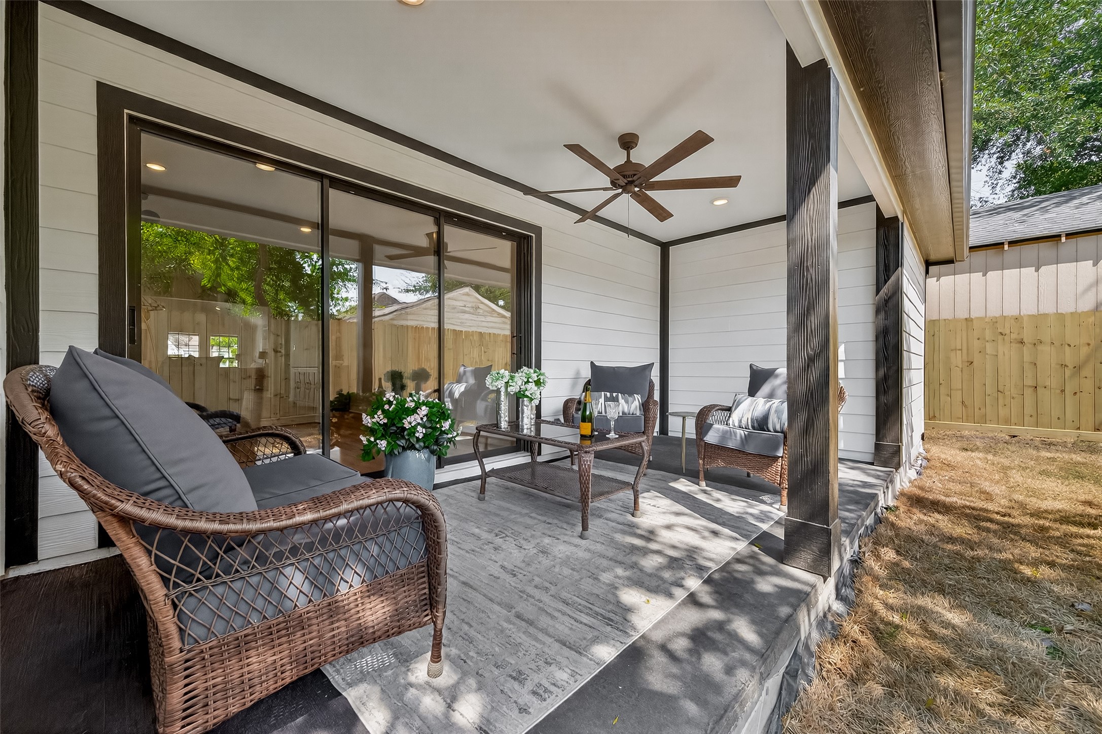906 Eleanor Street Houston, TX 77009 - Photo 2 of 36 a living room with furniture and a large window