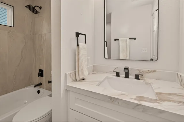 a bathroom with a bathtub
