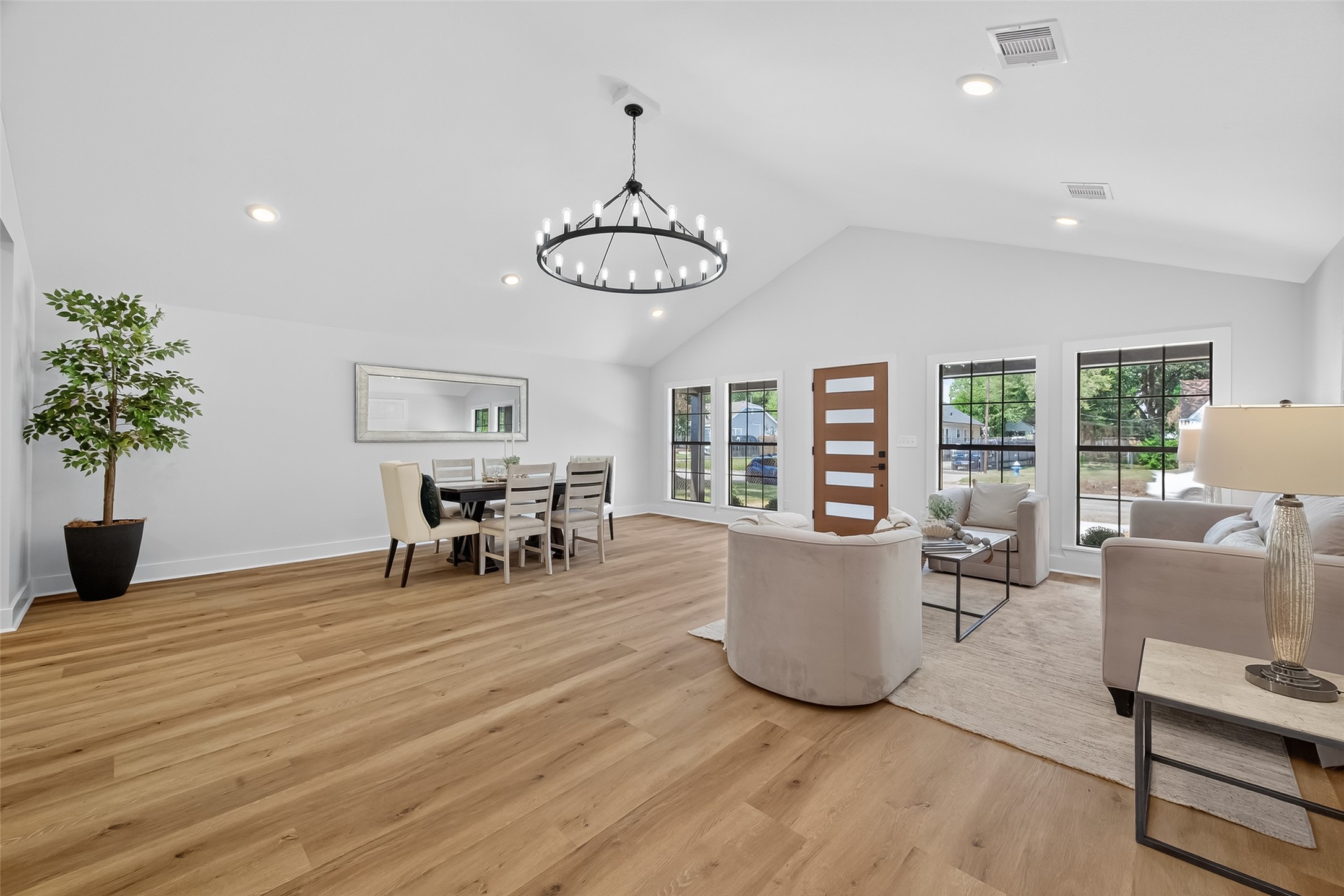 906 Eleanor Street Houston, TX 77009 - Photo 10 of 47 Space opposite is currently staged as a dining room - this could be one massive family room for you?!