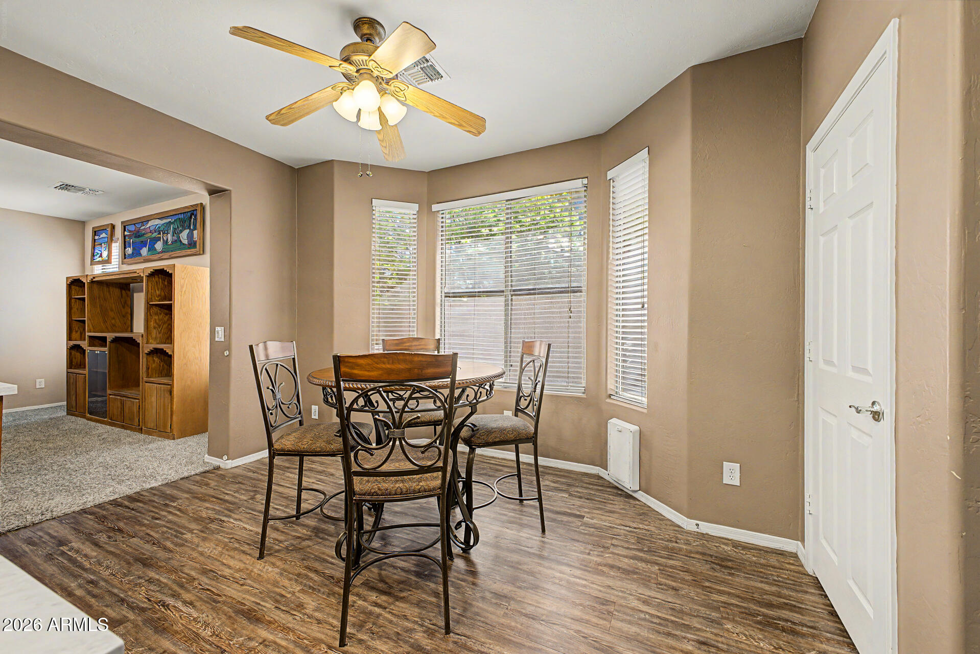 6622 West Harwell Road Laveen, AZ 85339 - Photo 9 of 32 a view of a dining room with furniture and window