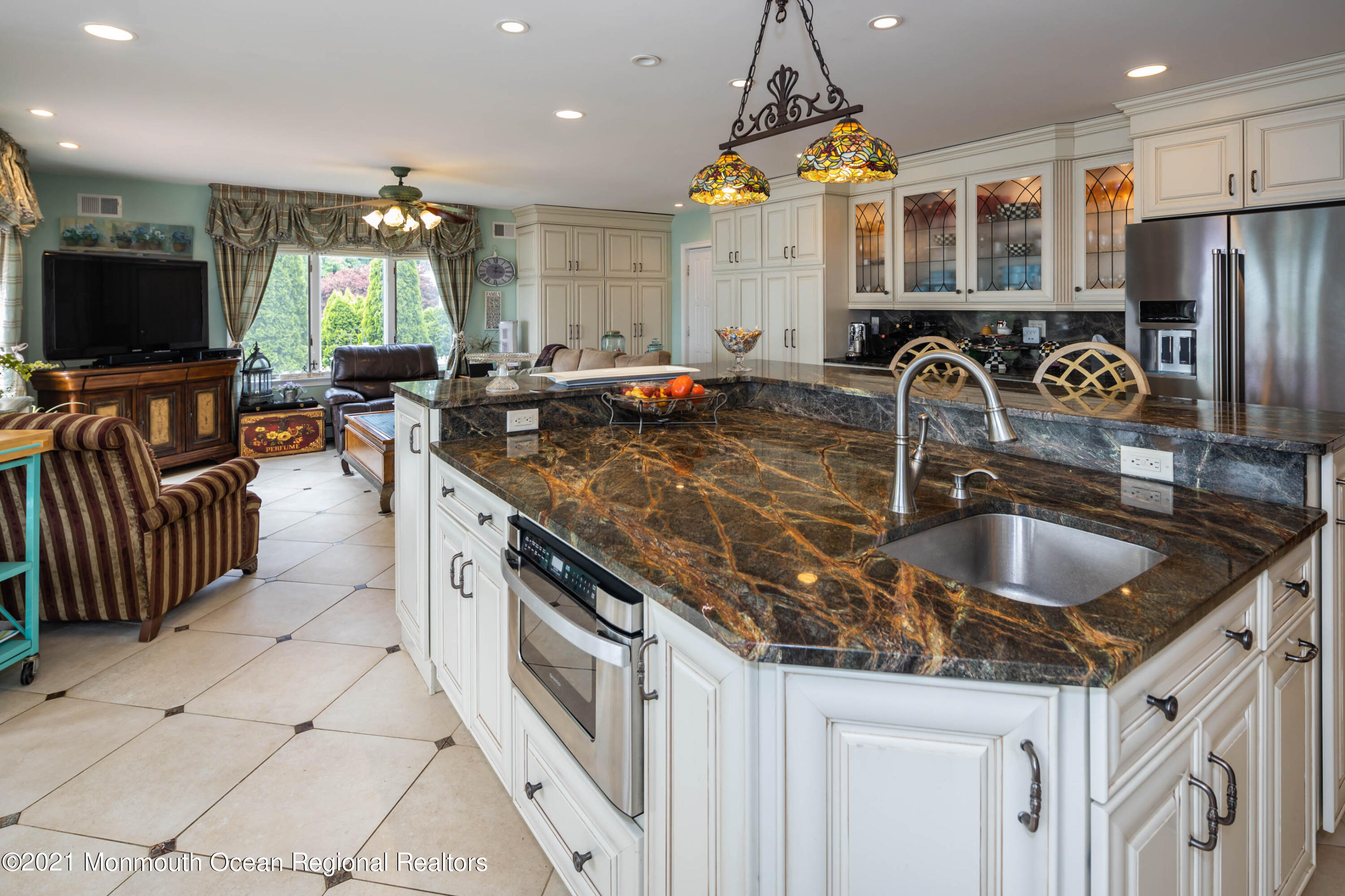 38 Conover Lane Red Bank, NJ 07701 - Photo 17 of 65 a kitchen with stainless steel appliances granite countertop a sink a stove and a refrigerator