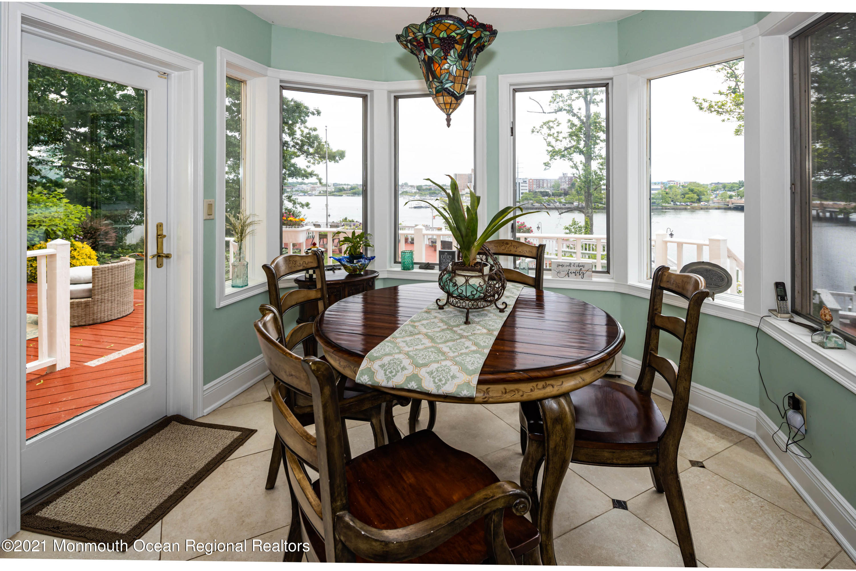 38 Conover Lane Red Bank, NJ 07701 - Photo 20 of 65 a view of a dining room with furniture window and outside view