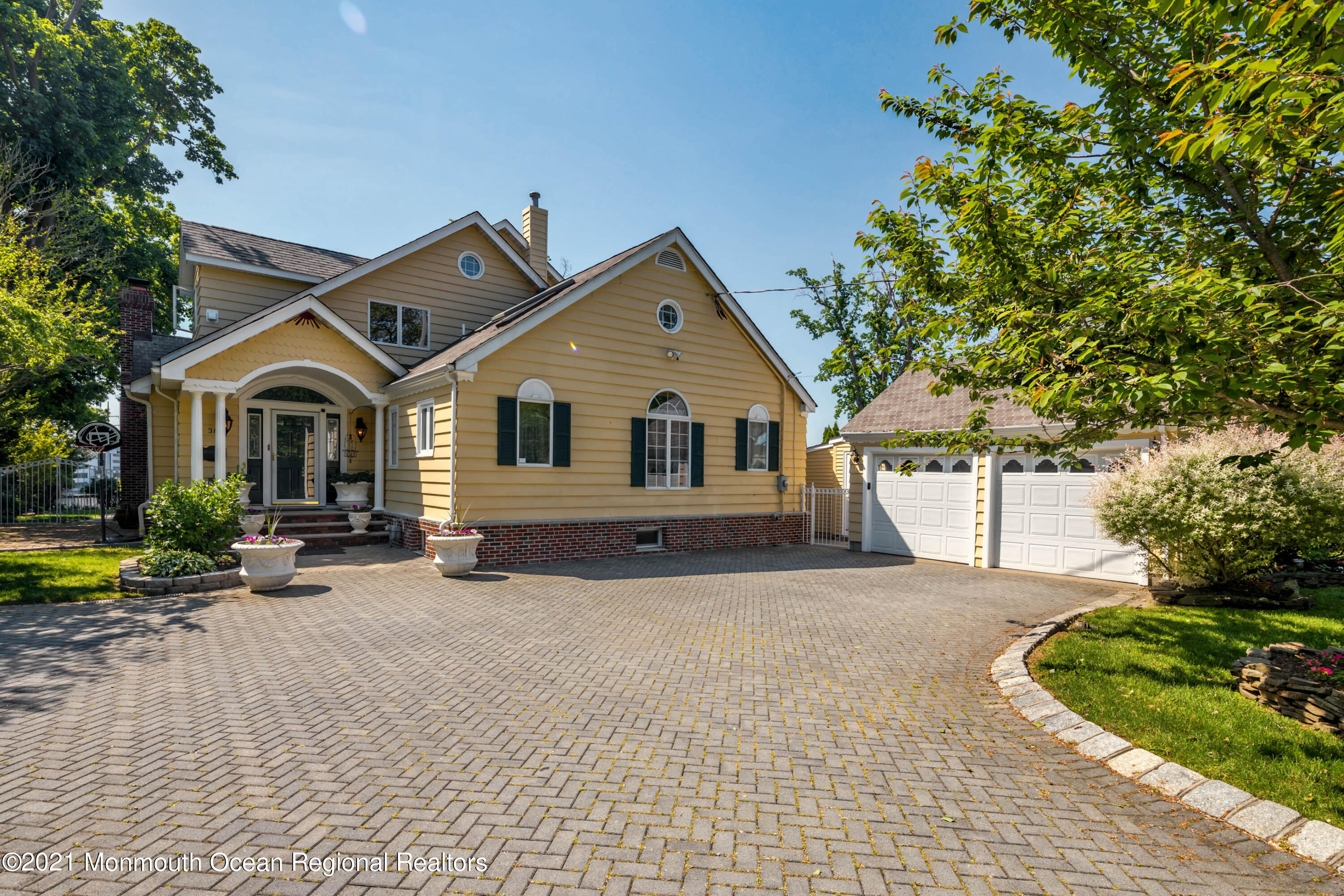 38 Conover Lane Red Bank, NJ 07701 - Photo 3 of 65 a front view of a house with a yard