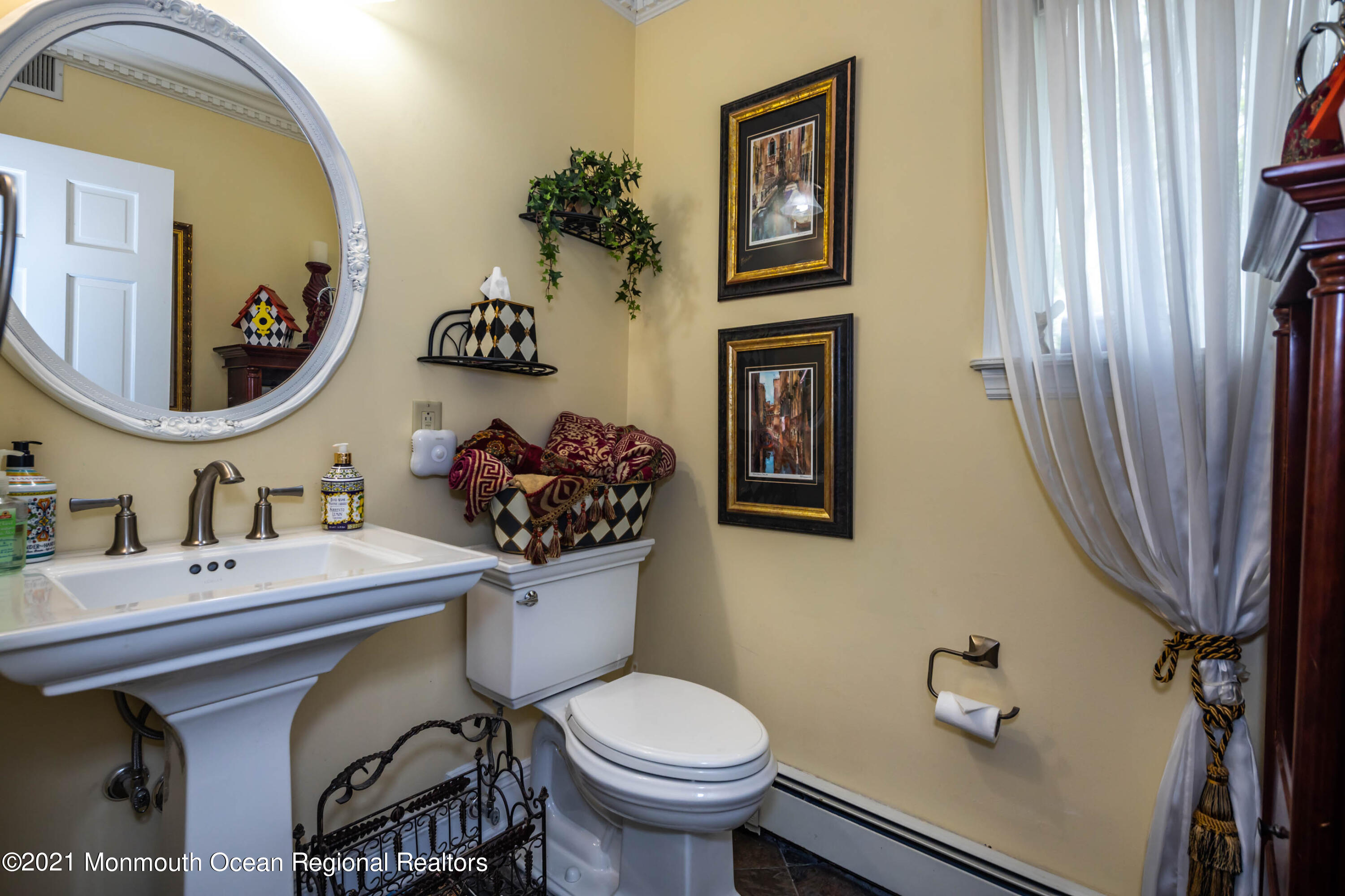 38 Conover Lane Red Bank, NJ 07701 - Photo 28 of 65 a bathroom with a sink mirror and toilet