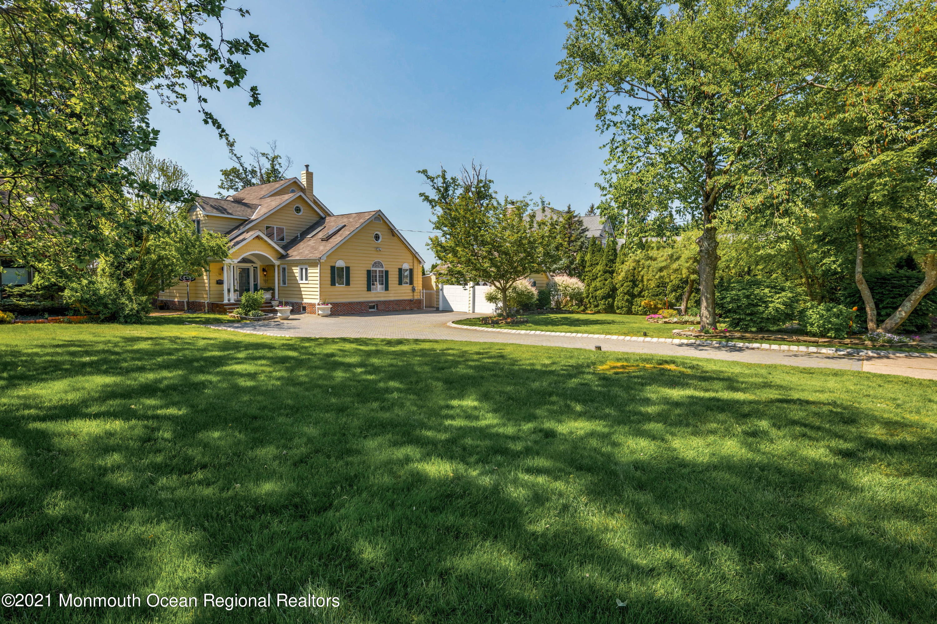 38 Conover Lane Red Bank, NJ 07701 - Photo 4 of 65 a front view of a house with a yard